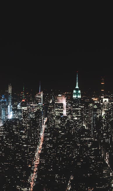 Bird's-eye View Photography of High Rise Building during Night Time