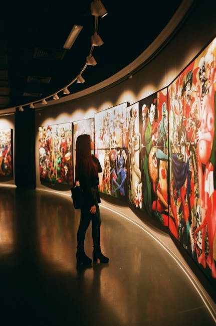 Woman Standing Near Paintings