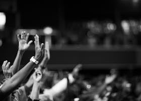 Grayscale Photography Of Hands Waving