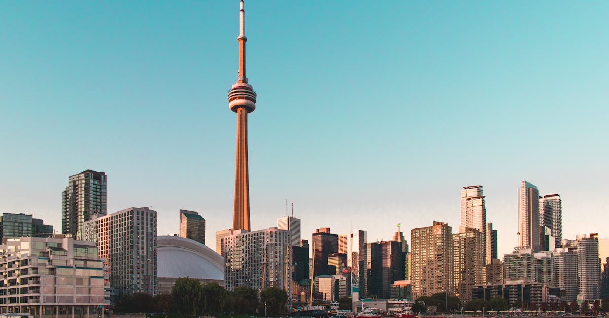 Beautiful view of Toronto's skyline featuring the iconic CN Tower during sunset.