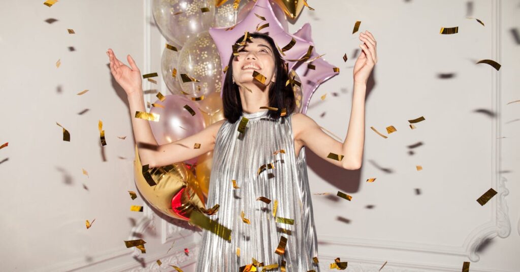 Joyous indoor celebration with balloons and confetti featuring a stylish young woman.